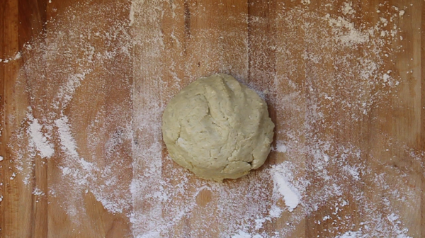 DogBuddy healthy dog treats recipe 5 ingredients in a dough ball in a floured surface
