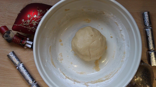 Dough ball in a bowl for a candy cane christmas dog treat recipe