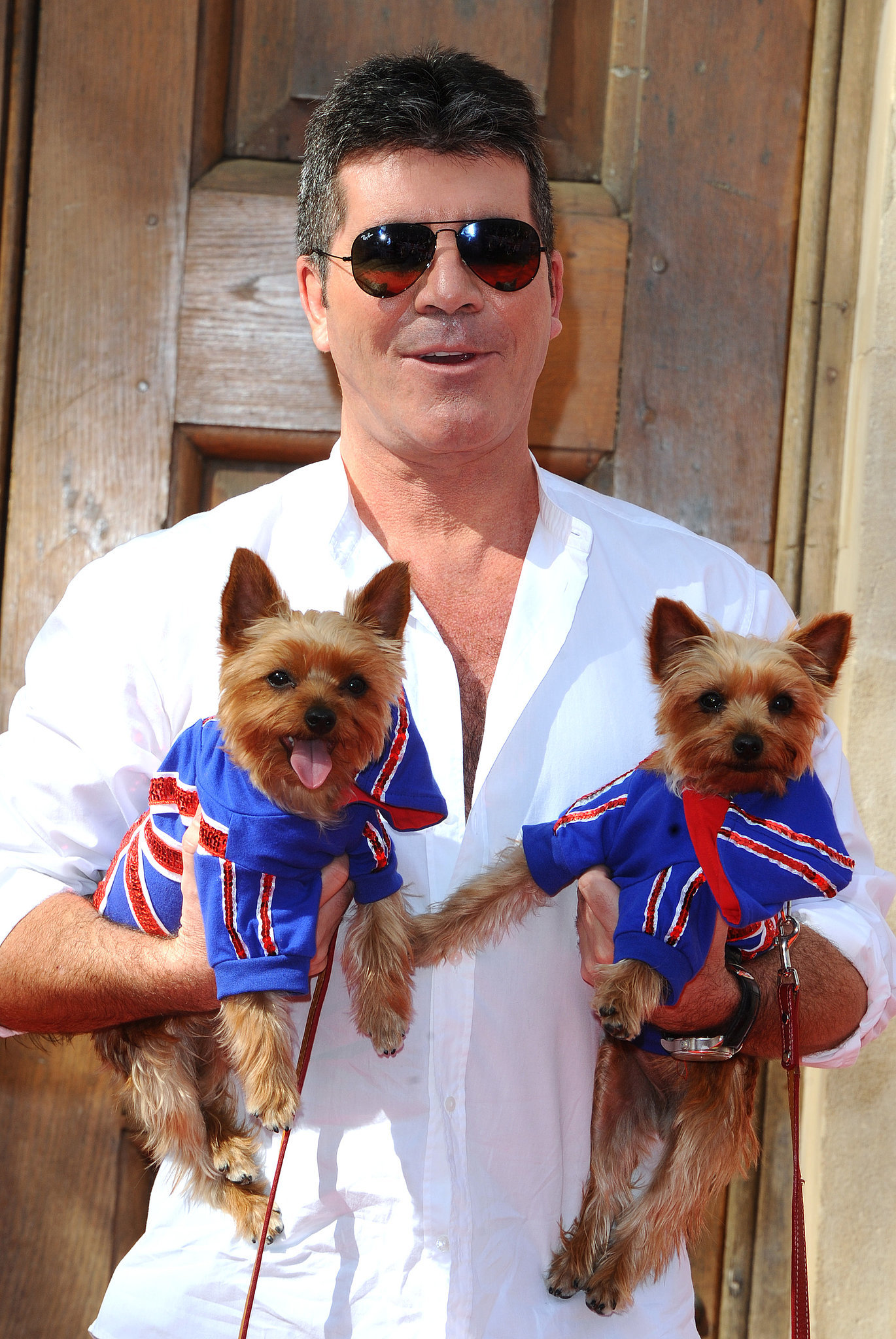 Simon-Cowell-dressed-up-his-two-dogs-special-event